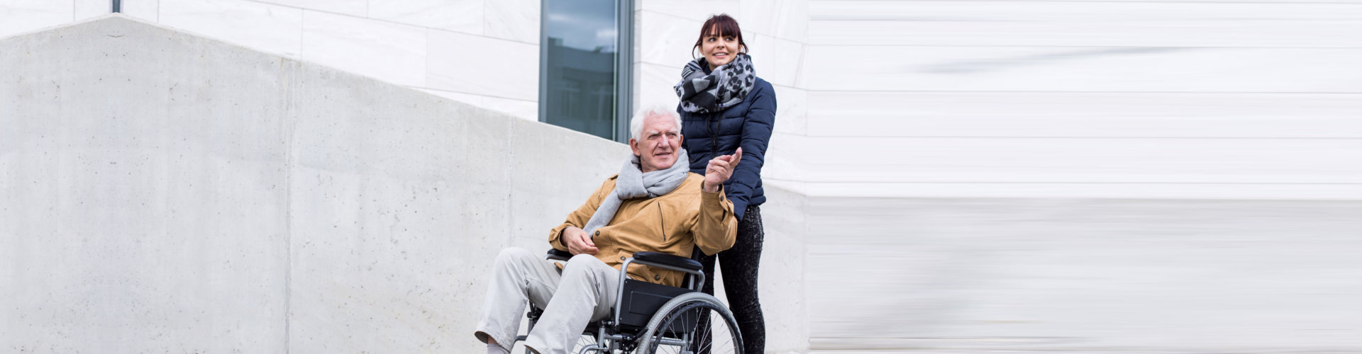 lady assisting the old man